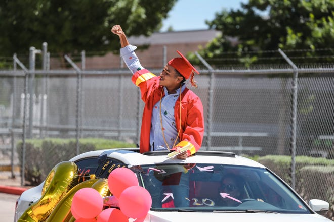 Centennial High School students attend a drive-thru graduation celebration at the Field of Dreams in Las Cruces on Friday, May 22, 2020.