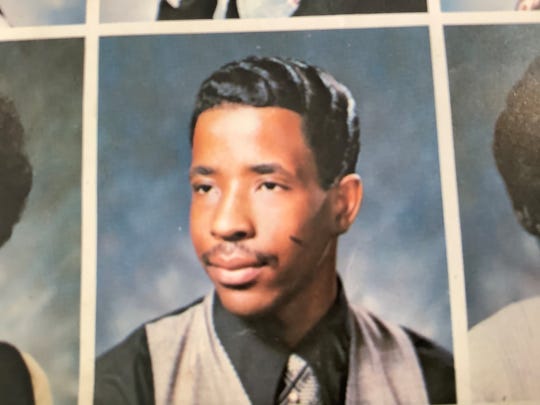 Larry Harris's photo in the Dunbar Vocational Career Academy yearbook in 1976.