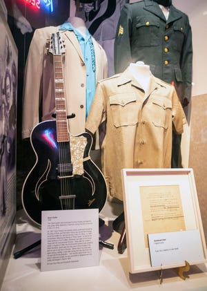 The 1958 Tsana brand guitar that was the instrument Elvis serenaded his future wife, the 14-year-old Priscilla Beaulieu is displayed at the Memphis Rock 'n' Soul Museum in Memphis, Tenn., on Saturday, May 23, 2020. 