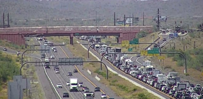 Traffic heading north on Interstate 17 for the holiday weekend starts to back up early afternoon on May 22, 2020.