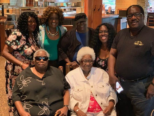 The Hatch family goes out to eat to celebrate Rhoda's 72nd birthday in Chicago, Ill. in 2018. Top row (from left to right) : Jennie Hatch, Priscilla Hatch (Marshall's wife), Anna Hatch, Josephine Hatch, Marshall Hatch Sr. Bottom row (left to right): Joan Hatch, Rhoda Hatch.