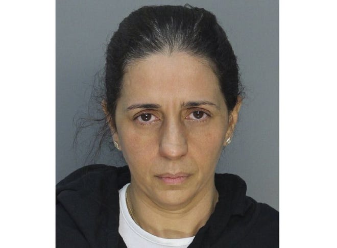 This photo provided by Miami-Dade Corrections and Rehabilitation shows Patricia Ripley. Officials say Ripley faked her son's abduction and instead led him to the canal where he drowned. Court records show 45-year-old Patricia Ripley is facing a first-degree murder charge. Her son was 9-year-old Alejandro Ripley and was autistic. The boy's body was found early Friday, May 22, 2020 at a golf course canal. (Miami-Dade Corrections and Rehabilitation via AP)