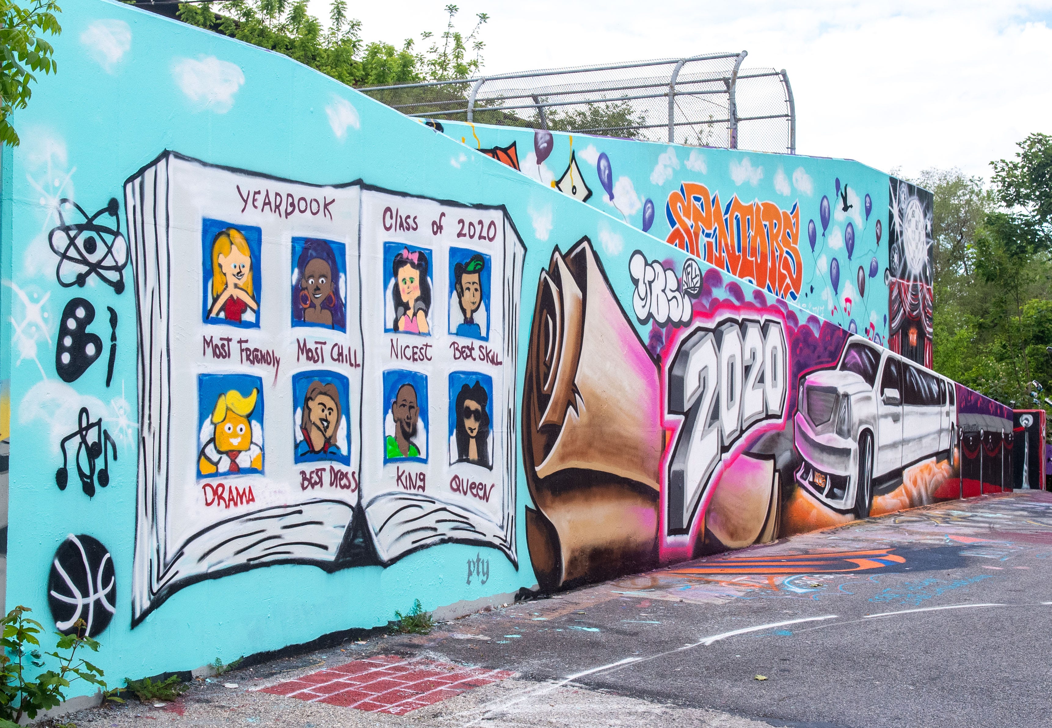 The York Bomb Squad, a local street art crew, created this detailed mural with prom and graduation essentials for the Class of 2020.