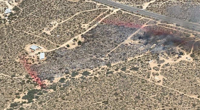 An 11-acre vegetation fire between Morongo Valley and Yucca Valley is nearly out after crews used aircraft to control the spread.