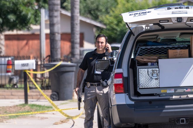 Visalia Police investigate the scene of a suspicious death on South Thomas Court north of Paradise Avenue on Tuesday, May 26, 2020.