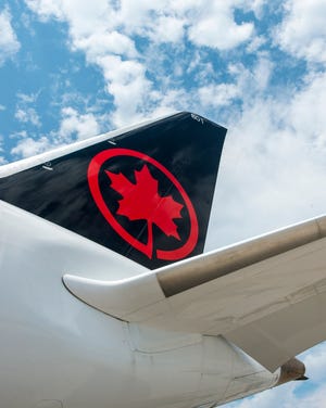 A plane flying for Air Canada, the country's national airline.