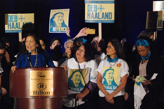 Rep. Debra Haaland, at the podium, seeks support from local party delegates at the Democratic Party preprimary convention in Pojoaque, N.M., in March 2020. Haaland has been working on Native American causes since volunteering for presidential hopeful Barack Obama's campaign in 2008.