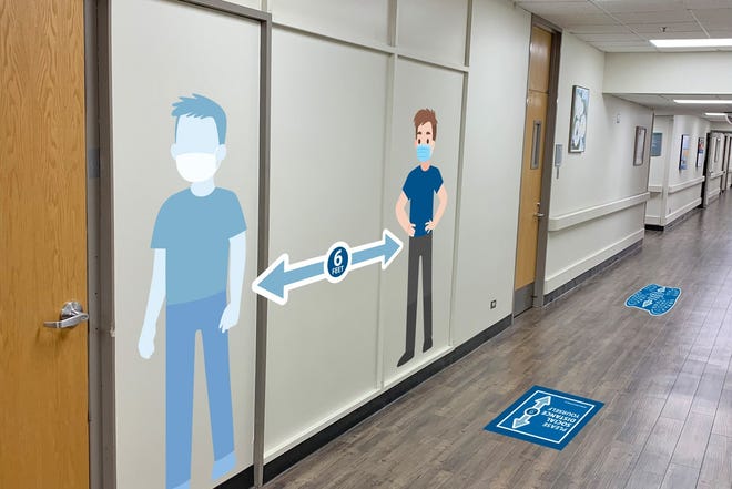 As Adena Health System begins to reopen, signage has been placed along the floor and walls to encourage and promote social distancing.