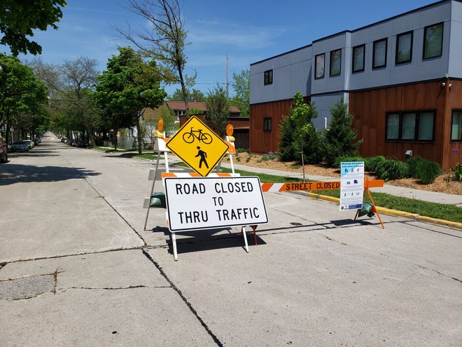 A barricade on N. Fratney Street at E. Meinecke Ave. indicates the street is closed to through traffic on May 27, 2020. The street is closed as part of Milwaukee Active Streets, a program launched by the city and county to create more space for walking and cycling during the coronavirus pandemic.