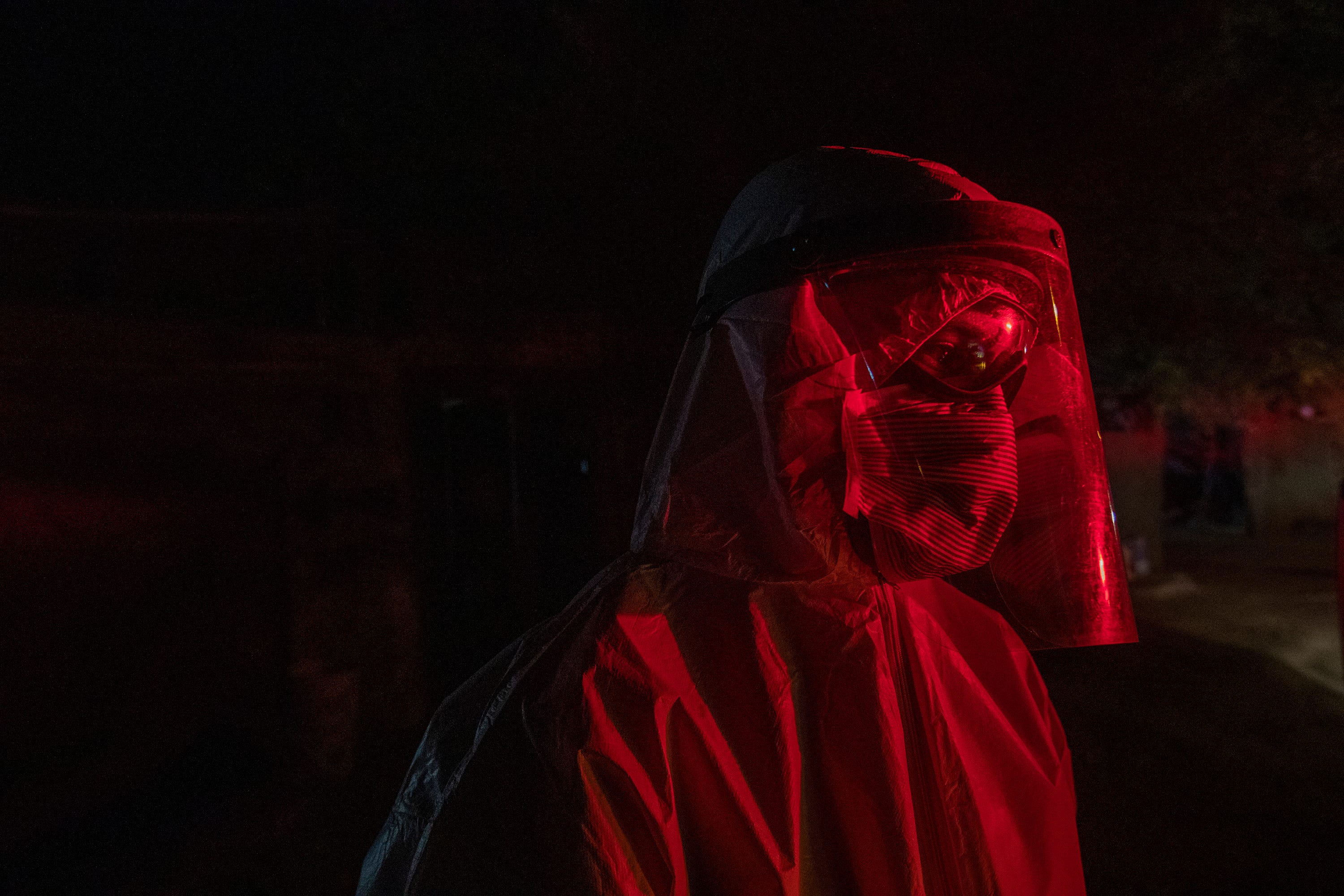 Ivan Jacob Zavala Peralta, 30, a paramedic with the Mexicali Fire Department. pauses to gather himself after he was unable to help a patient who died on a COVID-19 911 call in Mexicali on May 24, 2020.