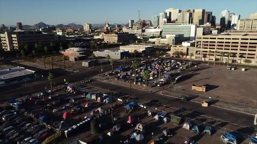 hundreds of people in phoenix homeless camp stuck outside during excessive heat