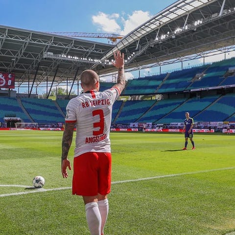 RB Leipzig's Angelino gestures before taking a cor