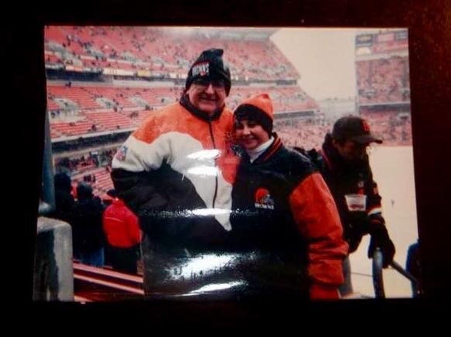 Beth Rosenberg Sanders and her dad at a Cleveland Browns game.