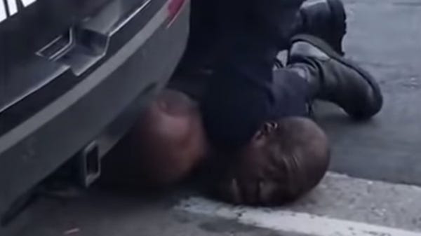 Minneapolis Police officer Derek Chauvin pins Geor