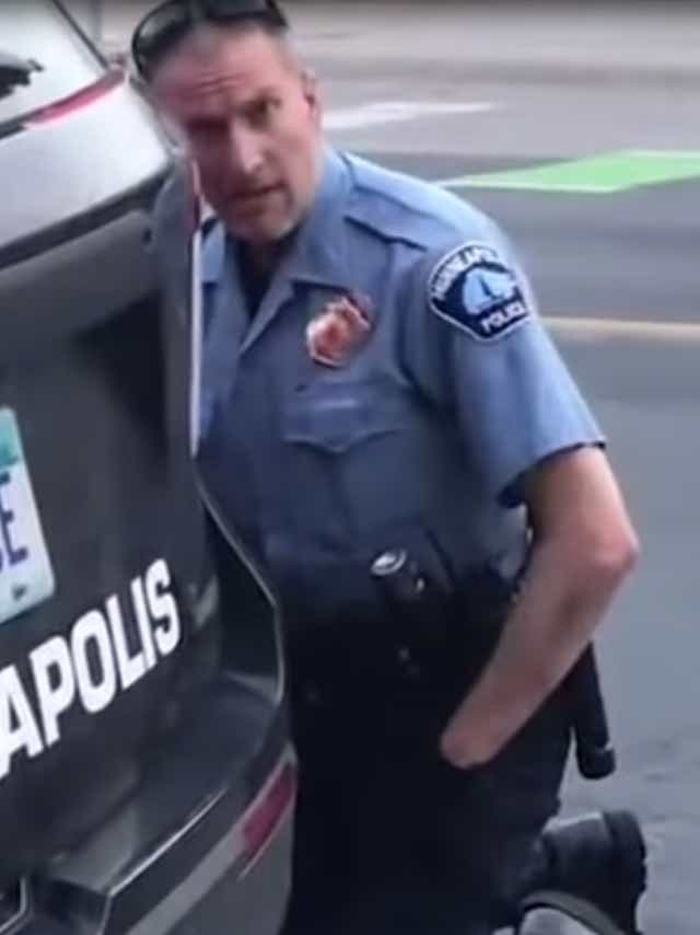 letters inhumanity stains the badge that stands for justice