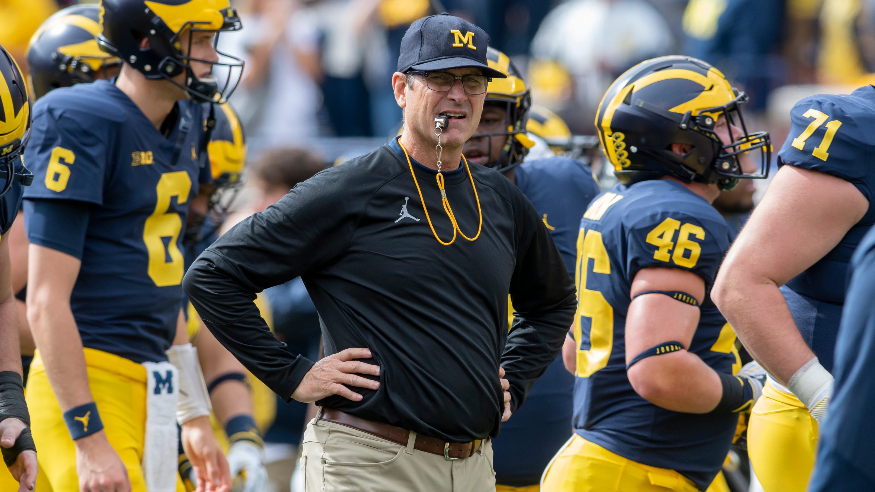 Michigan S Jim Harbaugh Juwan Howard To Take 10 Percent Salary Cuts