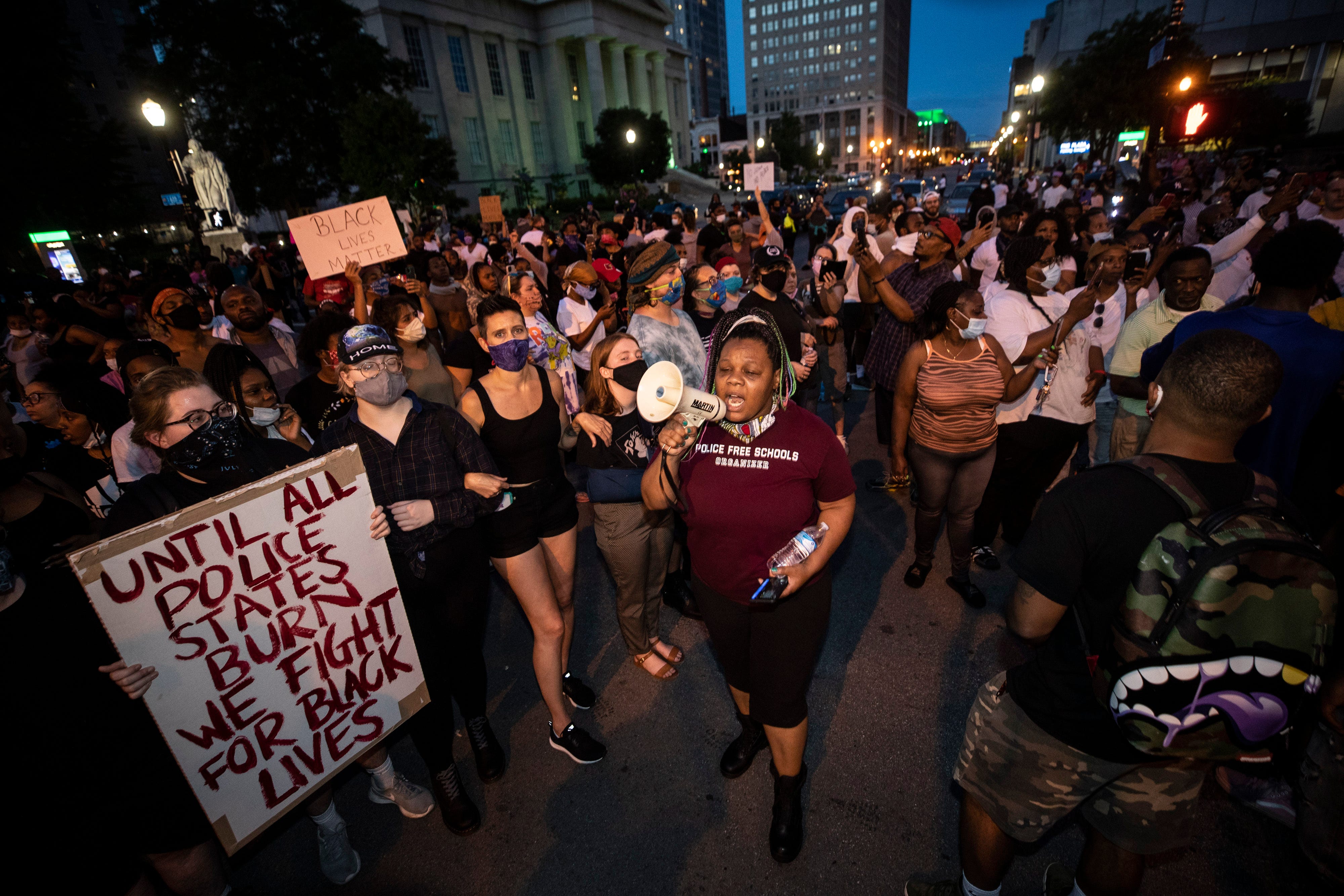 Scenes from a protest in downtown Louisville, Ky. over the shooting of Breonna Taylor by Louisville police. Organizers rally the crowd in the intersection of sixth and Jefferson streets. May 28, 2020