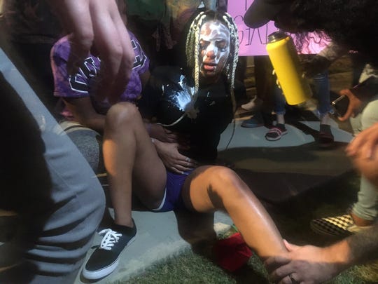 A pregnant woman is pepper-sprayed during the George Floyd protest in downtown Phoenix on Thursday, May 28, 2020.