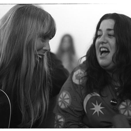 Joni Mitchell, left, and Cass Elliot. Mitchell's 1970 album "Ladies of the Canyon" was inspired by Laurel Canyon, a music mecca in the Hollywood Hills during the late '60s and '70s.