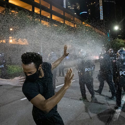Protesters are being sprayed by Detroit Police off