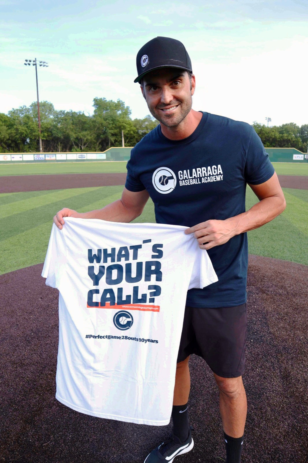 Former Tigers pitcher Armando Galarraga holds a T-shirt commemorating his one-hitter June 2, 2010, at Comerica Park.