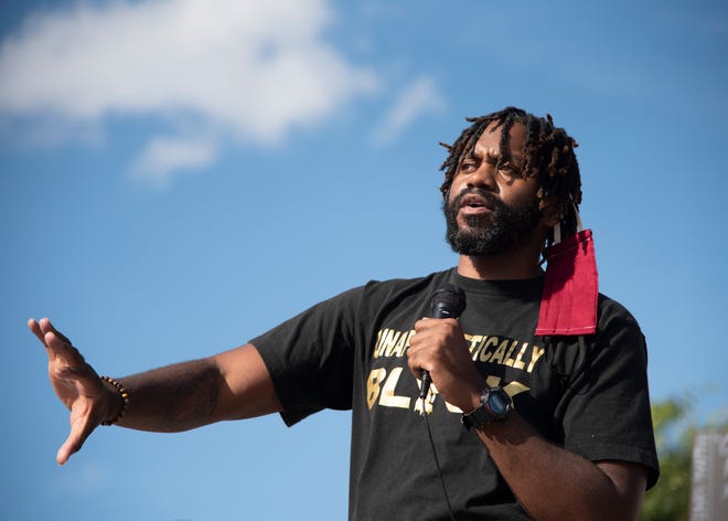 Denzel Grant speaks outside of the Knoxville police headquarters on May 29, 2020, at a rally calling for police accountability.