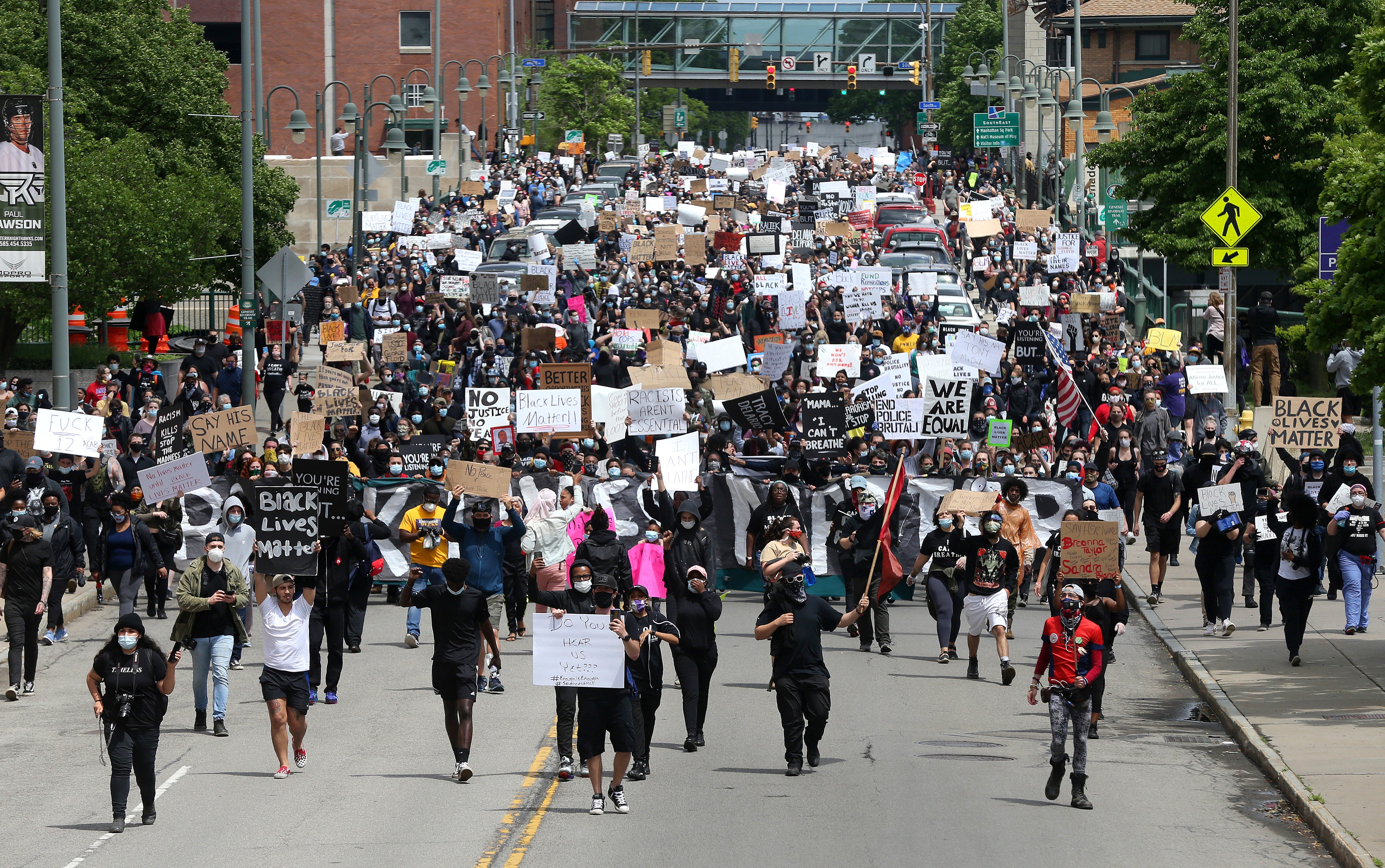 Several thousand protesters march on Court Street in downtown Rochester to the Public Safety Building and police headquarters, during a Black Lives Matter rally.