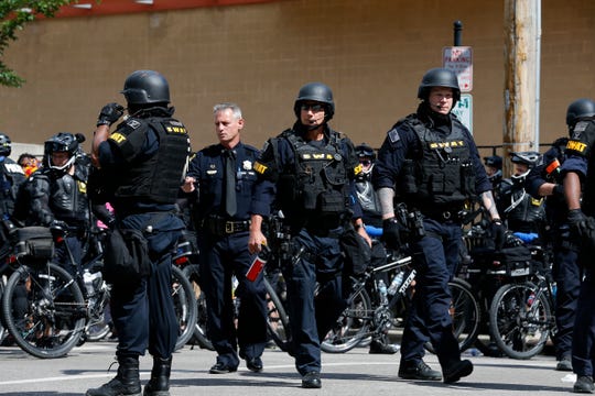 Cincinnati SWAT arrives on the scene as protesters gather at Washington Park in the Over-the-Rhine neighborhood of Cincinnati on Saturday, May 30, 2020. Hundreds of demonstrators took to the streets of Over-the-Rhine and downtown in solidarity with protesters in other US cities, speaking out against police brutality. 