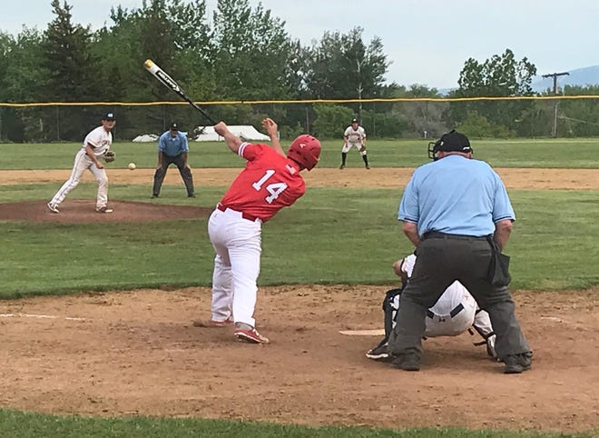 Lewistown's Lane Melton raps a single past Great Falls reliever Andrew Paradise, driving in two runs in the top of the ninth that was the difference in the Redbirds' 10-8 victory over the Chargers Saturday at Don Olson Field.