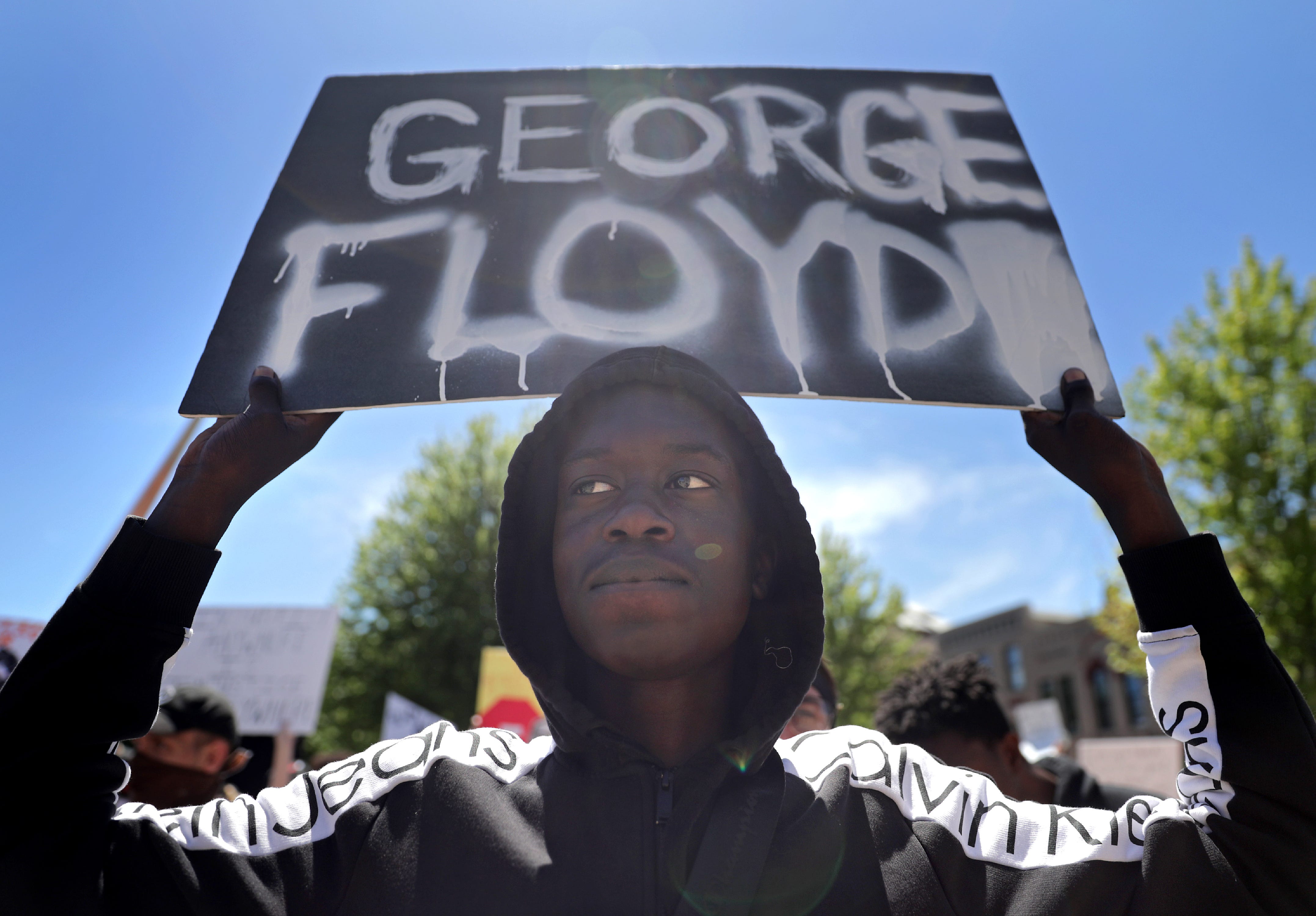 Ghandi Madut, Oshkosh, Wis., joins protesters during a Black Lives Matter march and rally on Sunday, May 31, 2020, in Oshkosh, Wis. Protests have been happening across the country this week, after George Floyd, a 46-year-old black man, was killed Monday by a white Minneapolis police officer who knelt on his neck while arresting him.