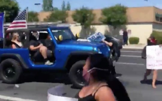A screengrab of a Jeep hitting Black Lives Marchers at a Visalia protest on Saturday.