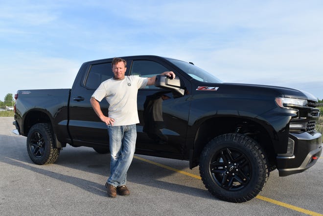UAW Local 2209 Shop Chairman Rich LeTourneau stands next to a 2020 Chevrolet Trail Boss Silverado pickup built on June 2, 2020. It was recently at GM’s Fort Wayne Assembly plant.