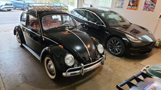 New meets old. The 1964 VW Bug (left) and a 2019 Tesla Model 3. Both are compact cars, both have frunks.