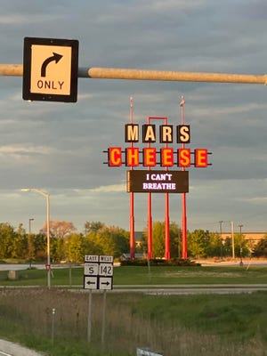 Mars Cheese Castle added the words "I can't breathe" to its sign. Photograph by Matthew MacCarron.