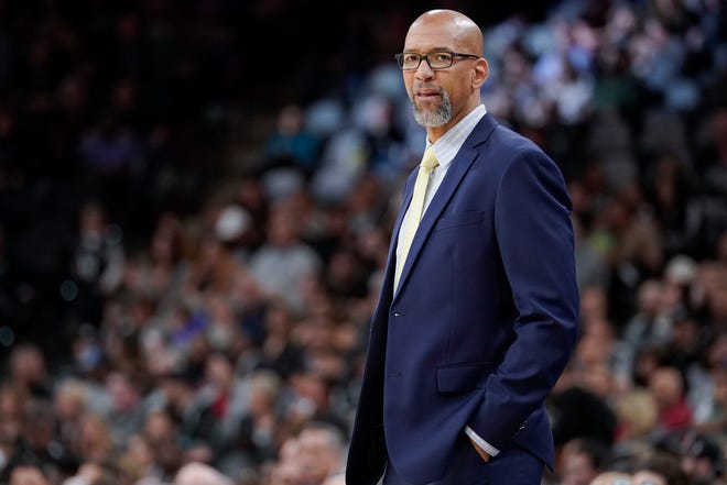Phoenix Suns head coach Monty Williams watches play during the first half of an NBA basketball game against the San Antonio Spurs, Friday, Jan. 24, 2020, in San Antonio. Phoenix won 103-99. (AP Photo/Darren Abate)