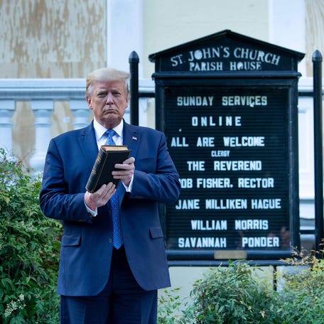 President Donald Trump holds a Bible while visiting St. John's Church across from the White House on June 1, 2020.