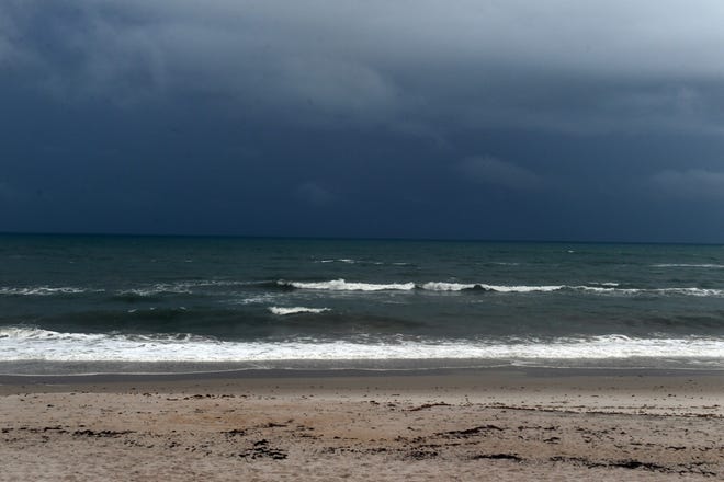 Rain beach. Rainy Beach. Rain on the Beach. Rain at the Beach. Raining on the Beach picture.