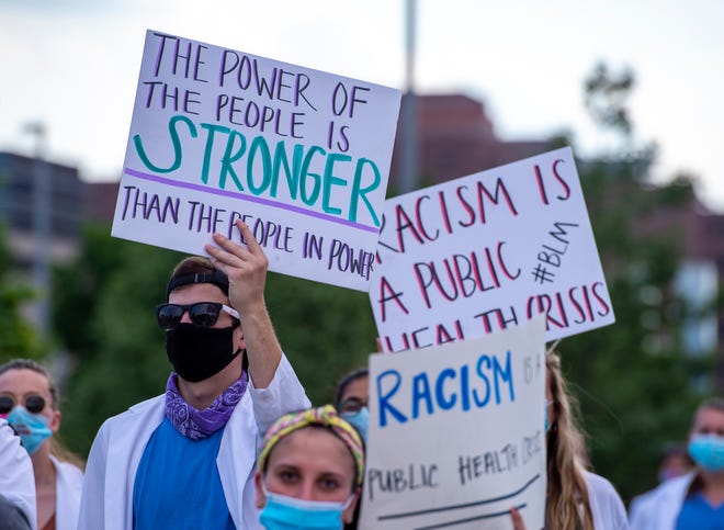 In Milwaukee and other cities where citizens have been protesting police brutality, health care workers are carrying signs demanding that racism be considered a public health crisis for the nation. Ohio counties and cities are considering and some are adopting resolutions officially embracing the approach.