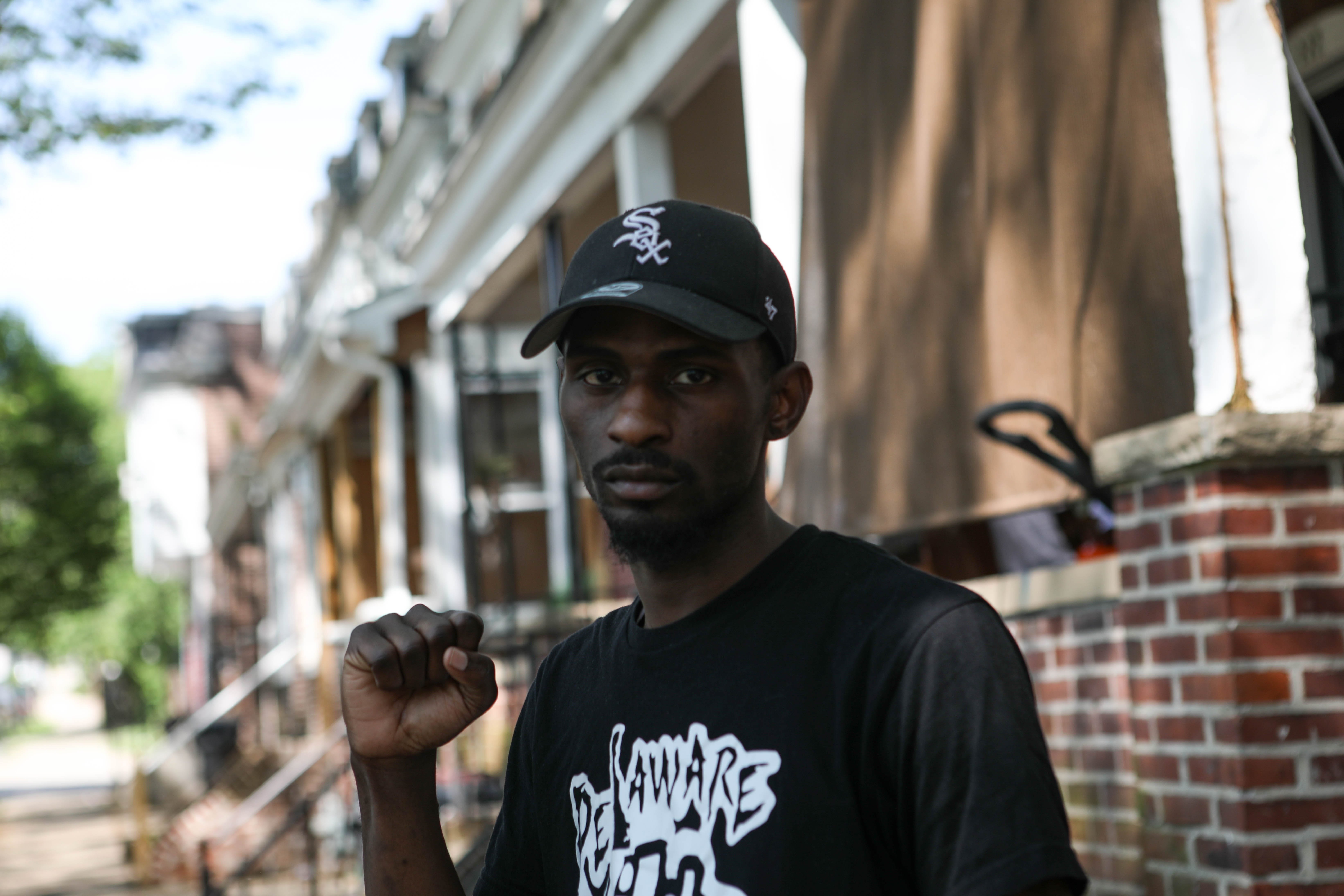Dorell Reynolds poses for a portrait in Wilmington on Thursday, June 3, 2020. Reynolds said at first he didn't support looting during Saturday's protest against police violence, but later changed his mind. "If you don't want to give us change we're gonna continue to riot," he said.