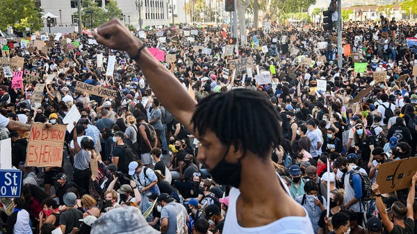 Thousands of people protest the death of George Fl