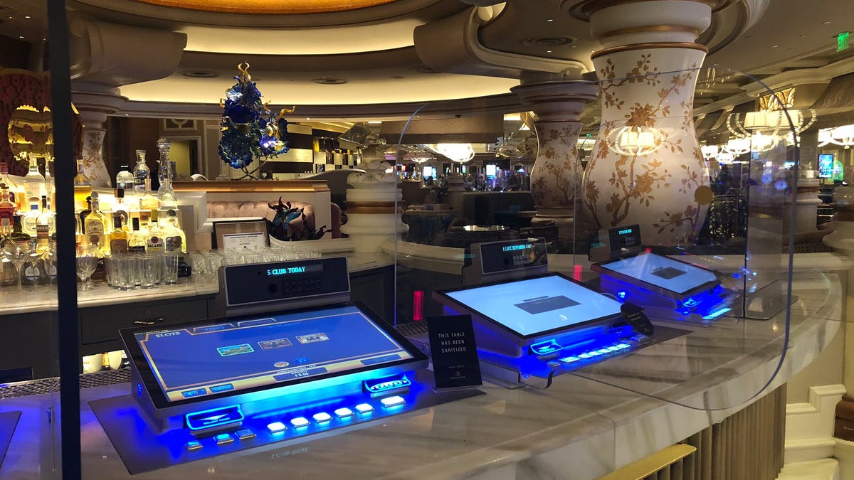 Bellagio has doubled down on coronavirus precautions with partitions separating video poker machines, blackjack and poker tables.