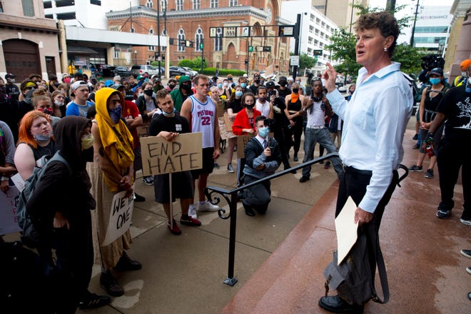 Charmaine McGuffey, the Democratic Candidate for Sheriff, speaks during the Cincinnati Black United Front (CBUF), the Ohio Justice & Policy Center (OJPC) and a broad coalition of civil rights activists and groups press conference, Thursday, June 4, 2020, in downtown Cincinnati outside City Hall. 