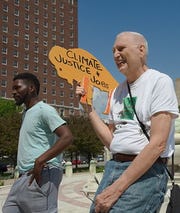 Martin Gugino shown in June 2019 at at Buffalo Youth Climate Strike rally.