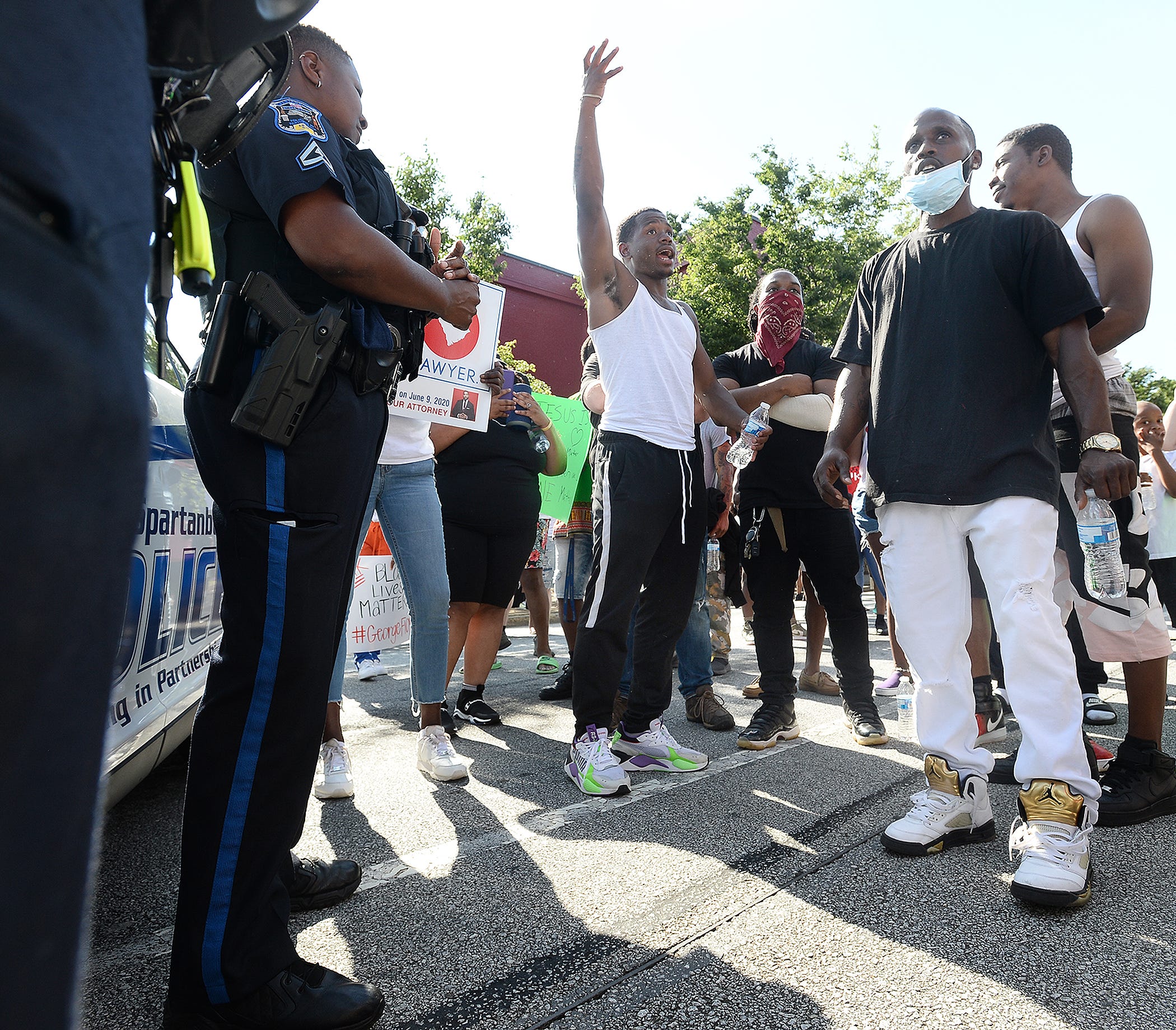 A group of peaceful protestors marched around the  Spartanburg downtown area and to Barnet Park on Sunday.