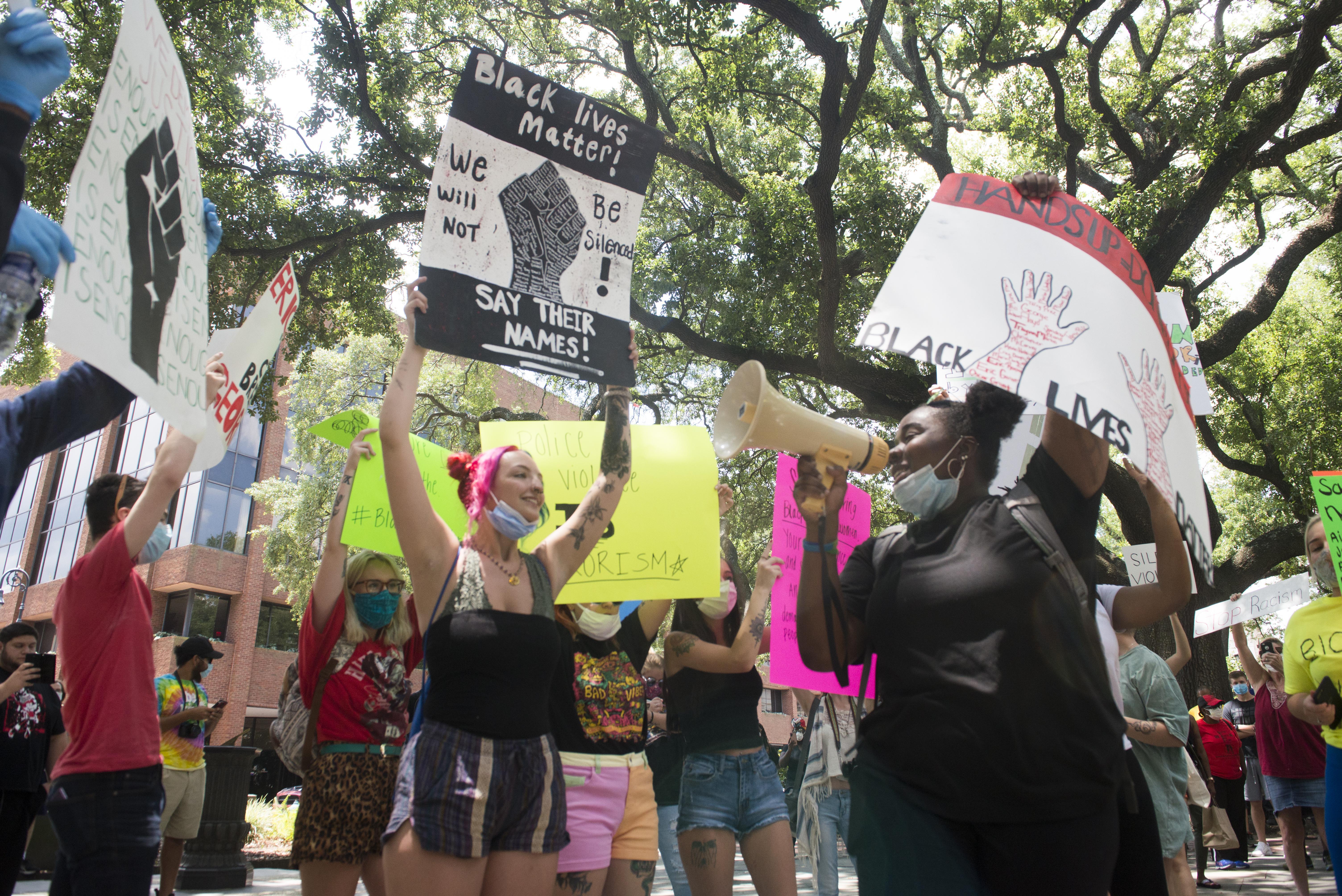 Protesters gather in Johnson Square in Savannah, Ga., on May 31.