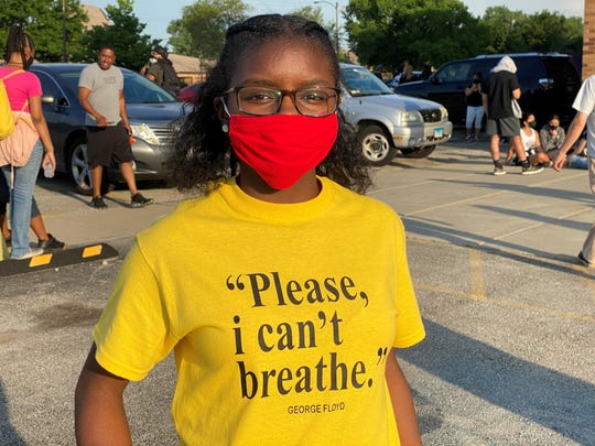 layci Muhammad, 14, wears George Floyd’s last words on a T-shirt as she joins a march in Chicago’s Bronzeville neighborhood on June 4, 2020.