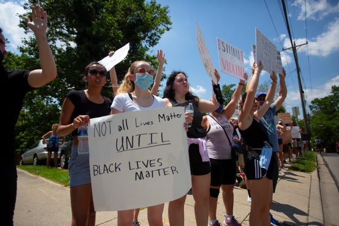 A crowd in Fort Mitchell marched in support of Black Lives Matter and demonstrated against the death of George Floyd, Saturday, June 6, 2020. George Floyd was killed May 25 at the hand of Minneapolis police. 
