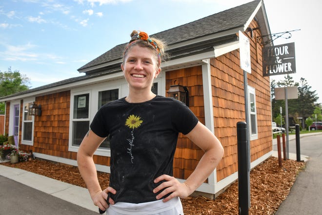 Erin Lucas takes a break from making sourdough bread to pose for a photograph outside Flour & Flower bakery Saturday, June 6, 2020, in St. Joseph.