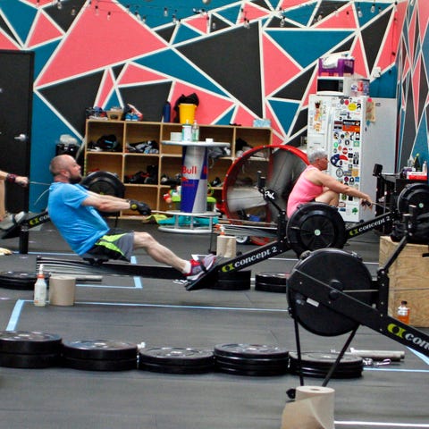 Members work out at Bridge View CrossFit in Jeffer