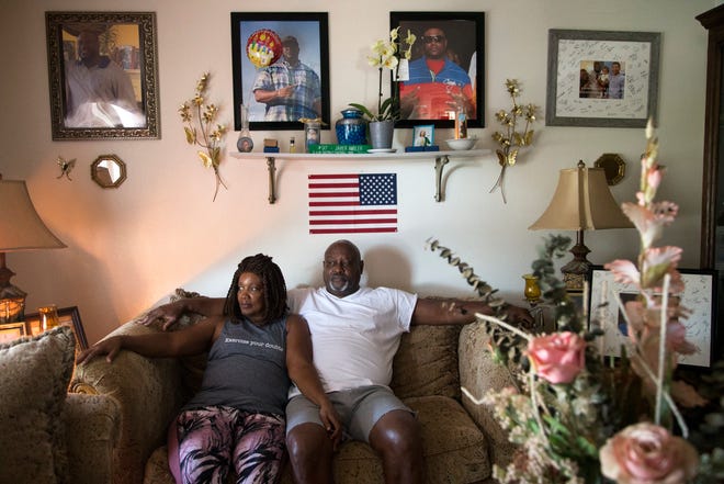 Maritza Ambler and her husband, Javier Ambler, have a memorial wall dedicated to their son in the living room of their Killeen, Texas, home.